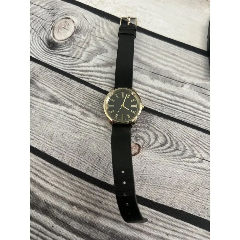 Gold Tone Black Band And Dial Women’s Quartz Watch